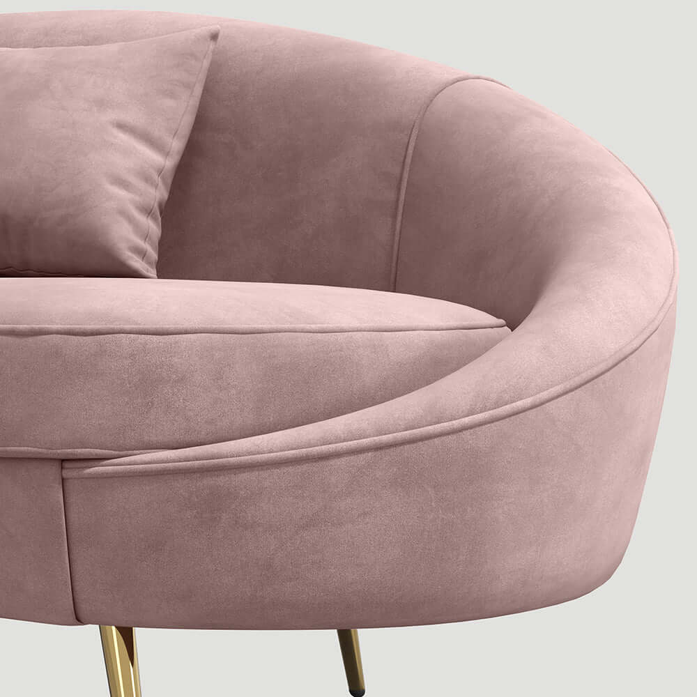 Pink velvet curved sofa with gold metal base, modern design, 63 inch length, includes toss pillow