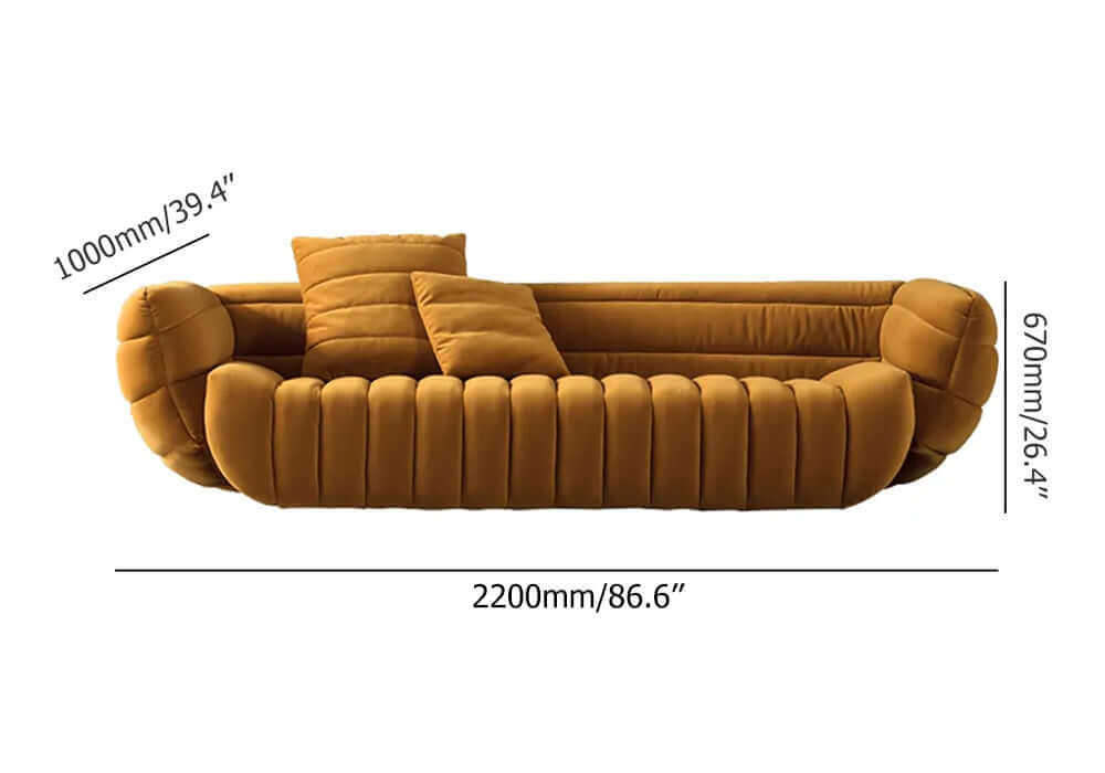 Yellow velvet upholstered sofa with soft cushions and luxurious design for comfortable seating