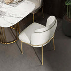 Elegant white dining chair with cotton & linen upholstery and lustrous gold finish