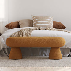 Elegant white and orange boucle bedroom bench with 2 legs and comfy upholstered top