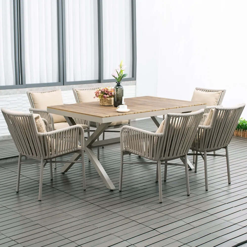 Outdoor dining set with wood top trestle table and 6 woven rope armchair メイン画像