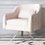 Pink velvet accent chair with modern design and comfortable upholstered armrests