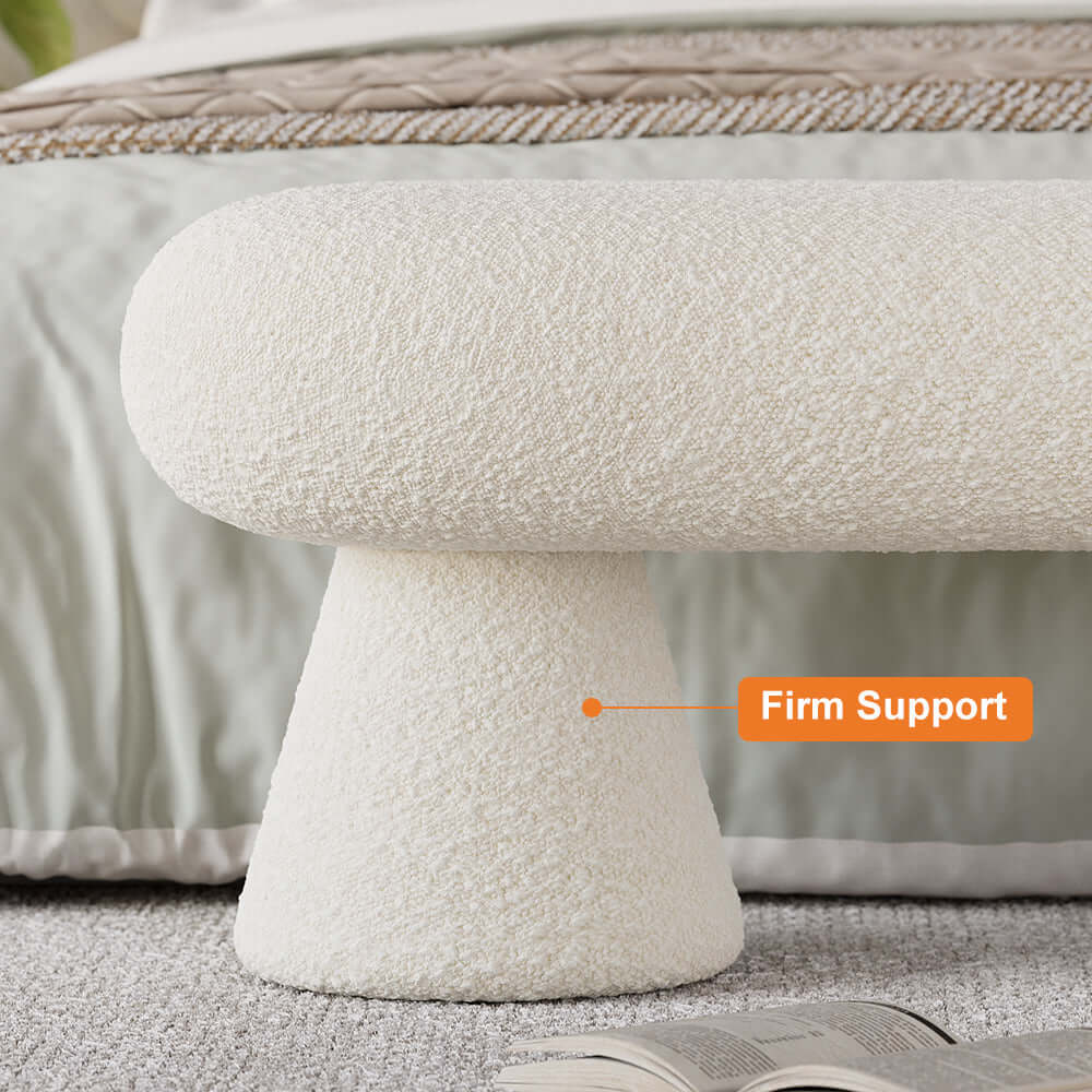 Fashionable white and orange boucle bedroom bench with 2 legs and plush upholstery