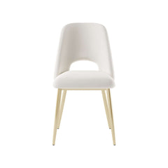 Elegant contemporary black dining chair with hollow back and gold metal legs