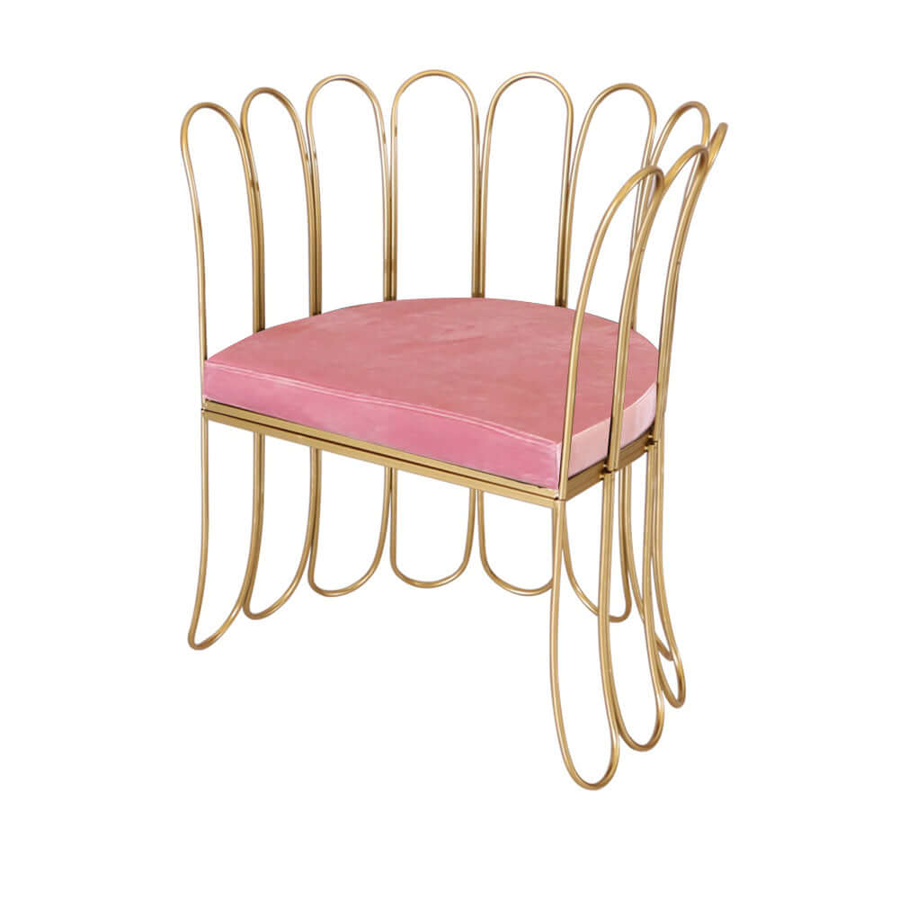Chic pink velvet upholstered chair featuring dazzling gold legs