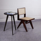 Stylish contemporary black accent chair with rattan and ash wood construction