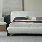 Luxurious modern white boucle platform bed featuring king size frame and elegant upholstered headboard design
