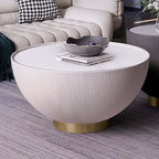 Versatile gray drum coffee table with stone round top and PU leather accent, ideal for modern living spaces