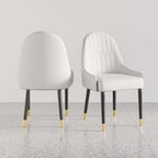 Trendy white and orange dining chairs with metal legs, set of 2, designed with PU leather for upscale dining experience
