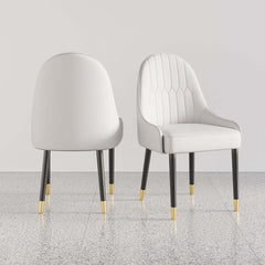 Trendy white and orange dining chairs with metal legs, set of 2, designed with PU leather for upscale dining experience