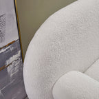 White cream boucle accent chair with matching pouf ottoman for modern lounge seating