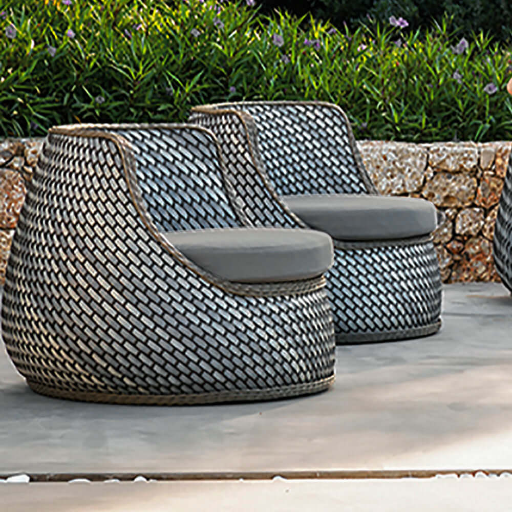 Comfortable Dark Gray Outdoor Patio Rattan Armchair with Cushions for Relaxing Outdoors