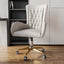 Modern white leather ergonomic office chair with swivel and adjustable height