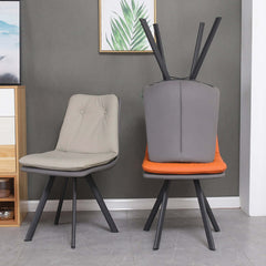 Stylish and modern dining chair in vibrant orange PU leather