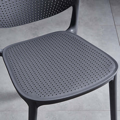 Versatile modern deep gray plastic chairs ideal for home use