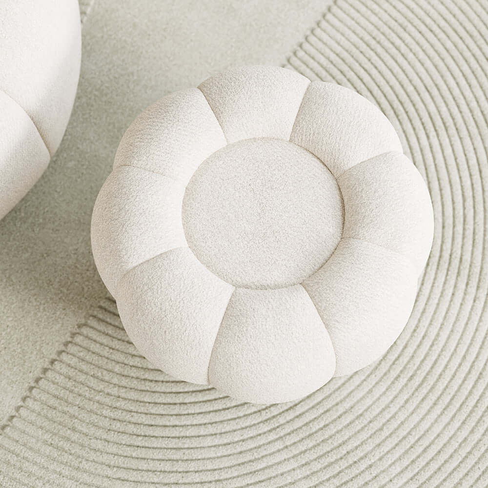 White cream boucle pumpkin pouf ottoman for a cozy and inviting space