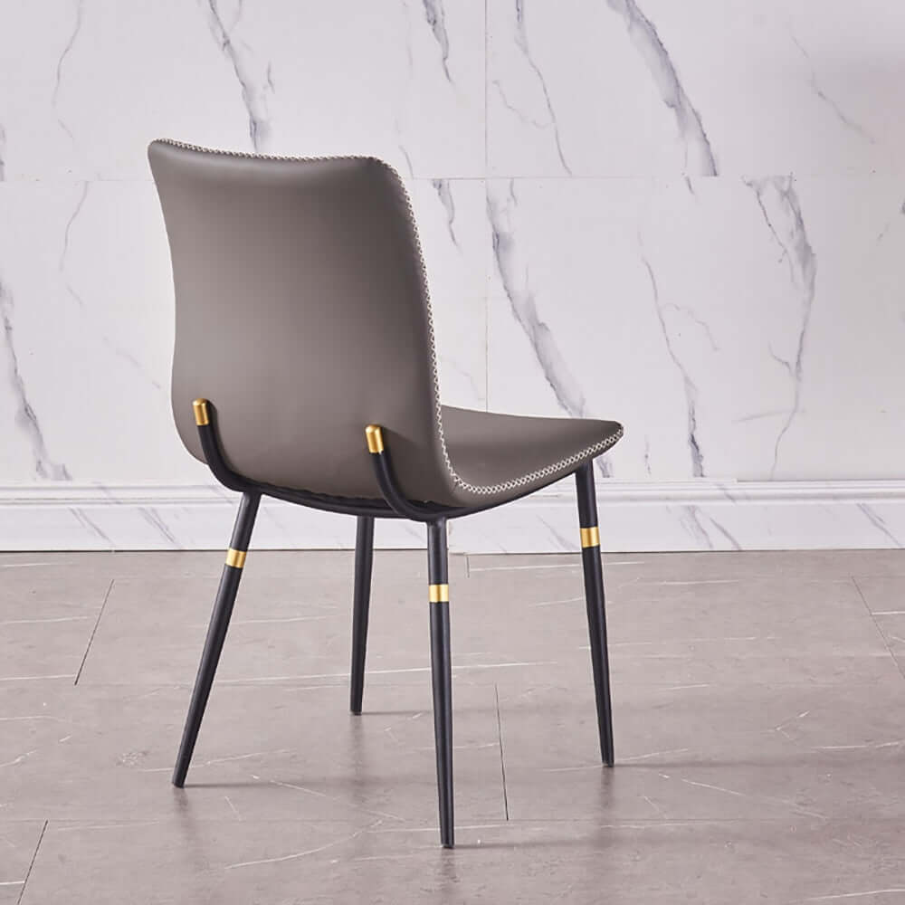 Stylish high backed dining chairs with upholstered leather in a set of 2