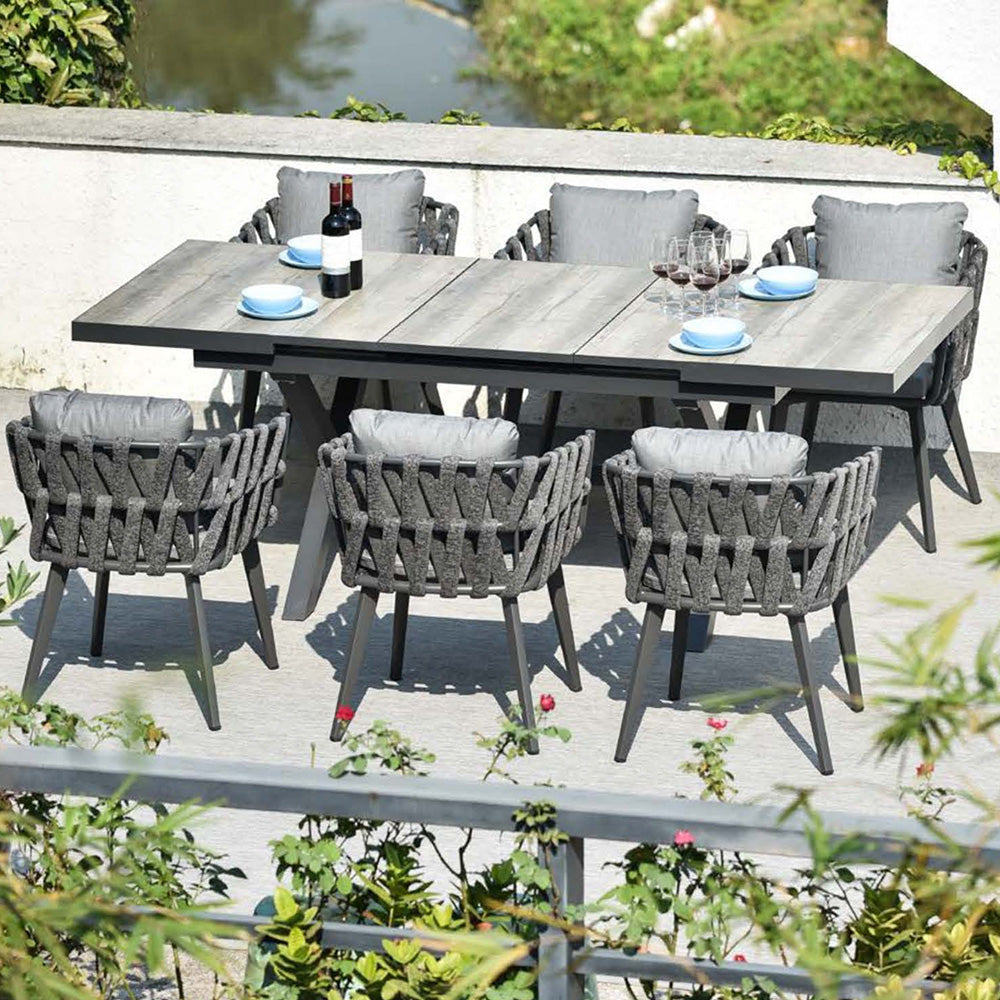 Outdoor dining set with extendable ceramic table and woven aluminum armchairs, 7 pieces main product image メイン画像
