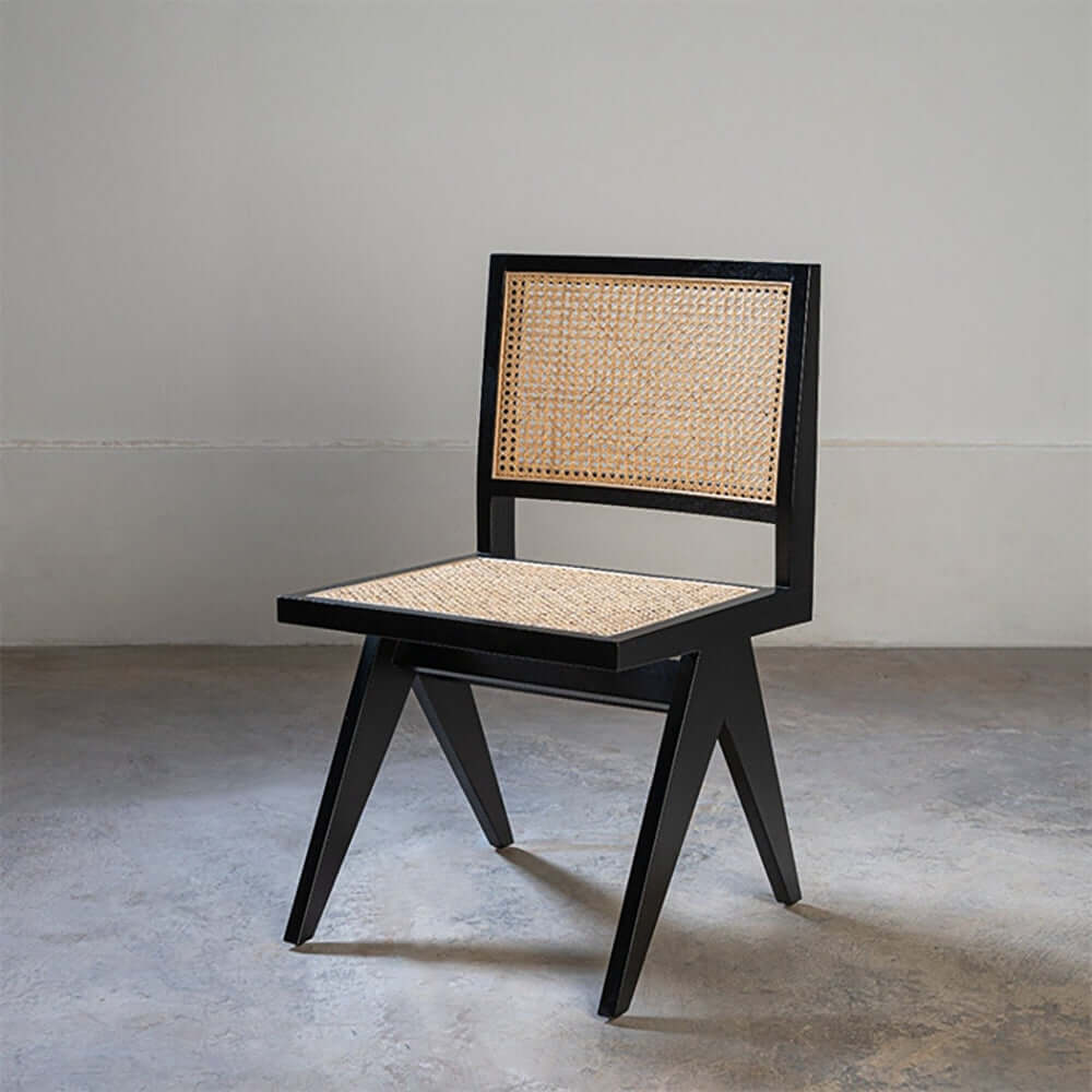 Modern black accent chair with rattan and ash wood in minimalist style Main image