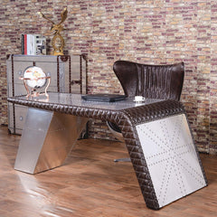 Modern brown & silver office chair with wing back, upholstered in leather, perfect for long work hours