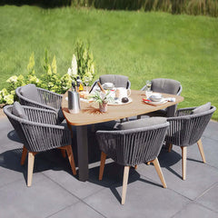 7Piece Outdoor Dining Set with Triangular Dining Table and Rattan Armchairs for Outdoor Entertainment and Relaxation