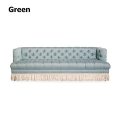 Velvet upholstered sofa with retro tassel accents for stylish and comfortable lounging