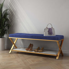 Blue upholstered entryway bench with storage and X-shaped base for versatile use