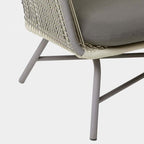 Outdoor PE rattan loveseat with metal legs and cushion pillows for patio seating