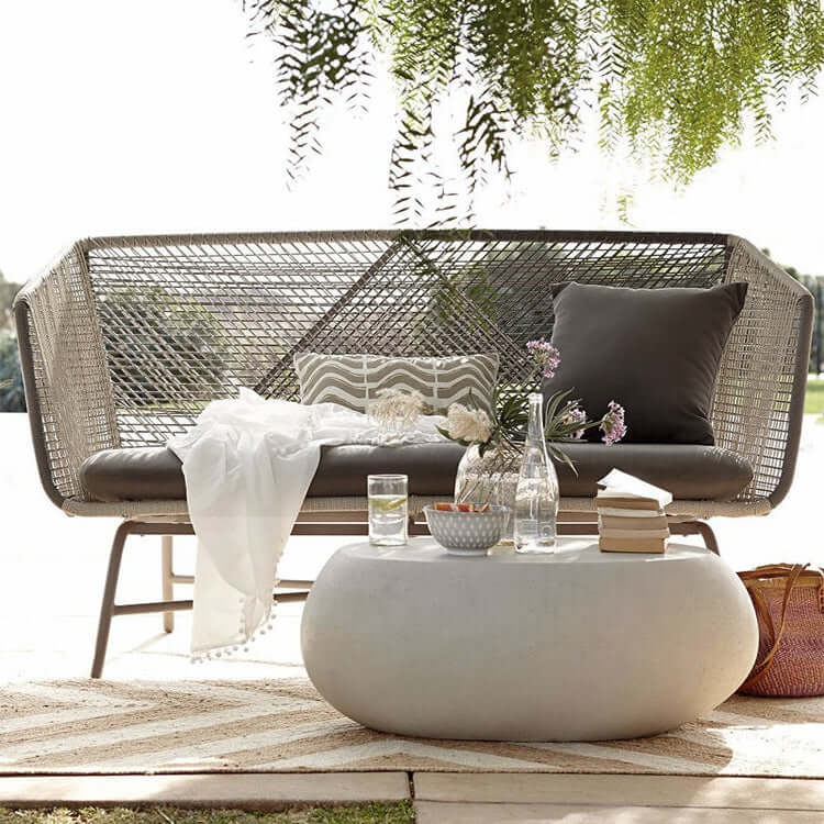 Outdoor PE rattan loveseat with metal legs and cushion pillows for patio seating